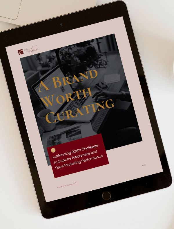 iPad on table next to coffee, displaying the cover of an ebook titled "A Brand Worth Curating"